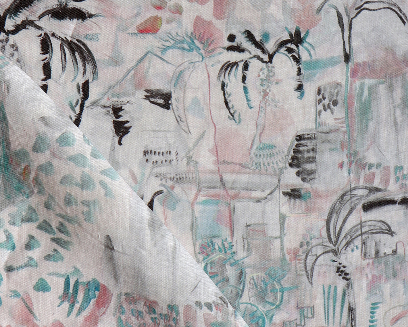 A close up of a pink and blue fabric with palm trees on it