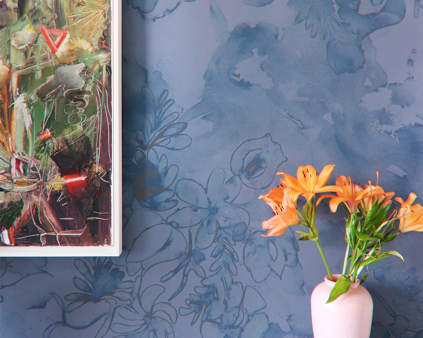 A vase of orange flowers on a table