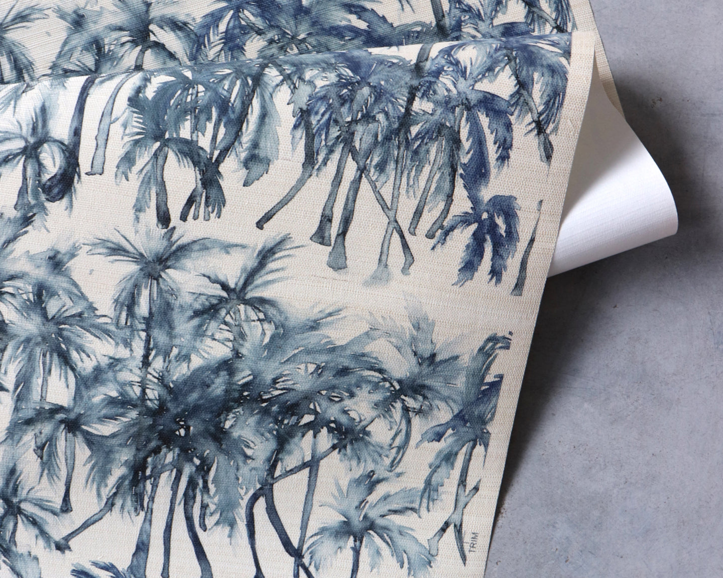 A blue and white paper with palm trees
