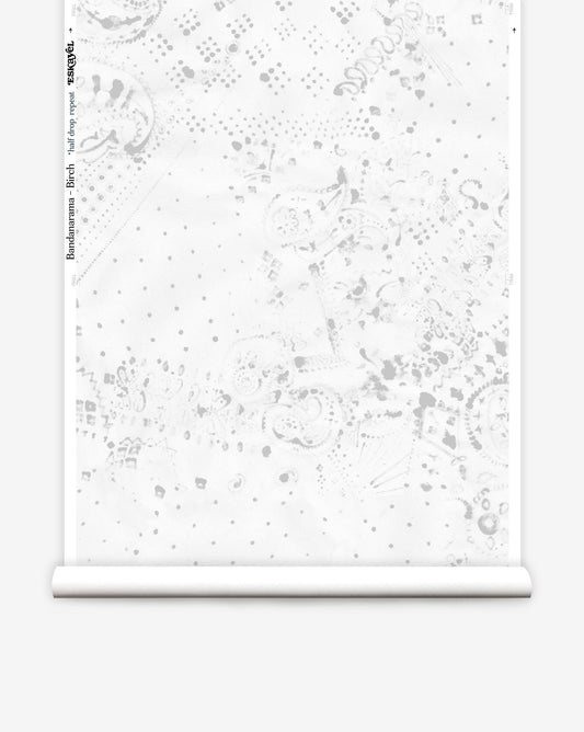 In Bandanarama custom wallpaper in Birch, bandana motifs and dots are rendered in grey