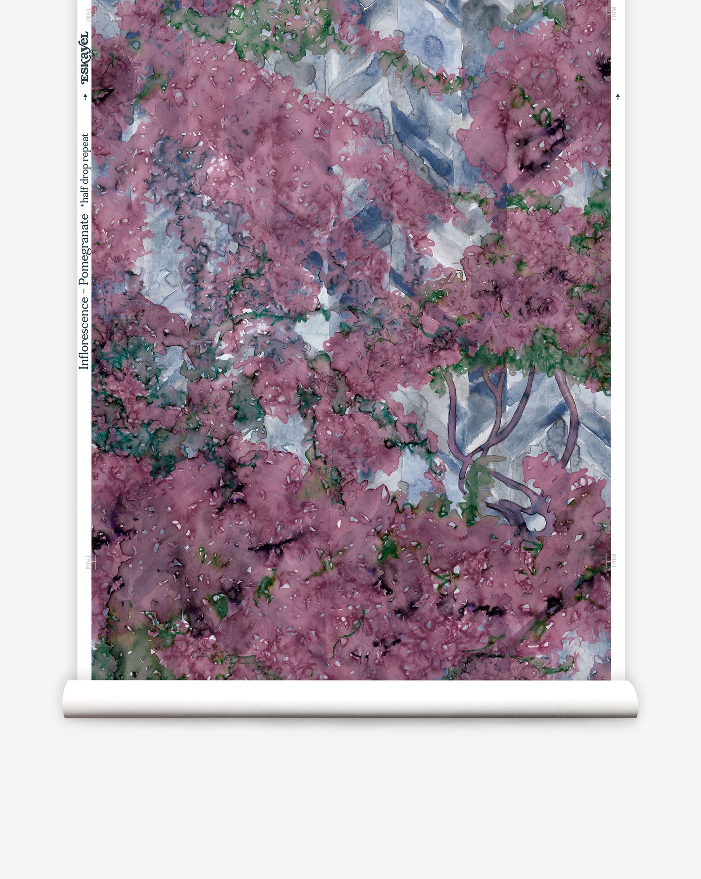 Featuring a floral study on chevrons, Inflorescence wallpaper in the Pomegranate colorway features vibrant shades of blue, green and magenta