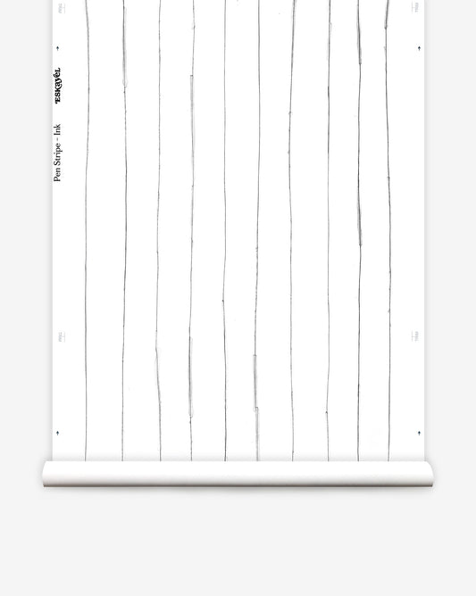 A linear wallpaper pattern inverts tradition with hand-inked stripes Pen Stripe in Ink is black on white