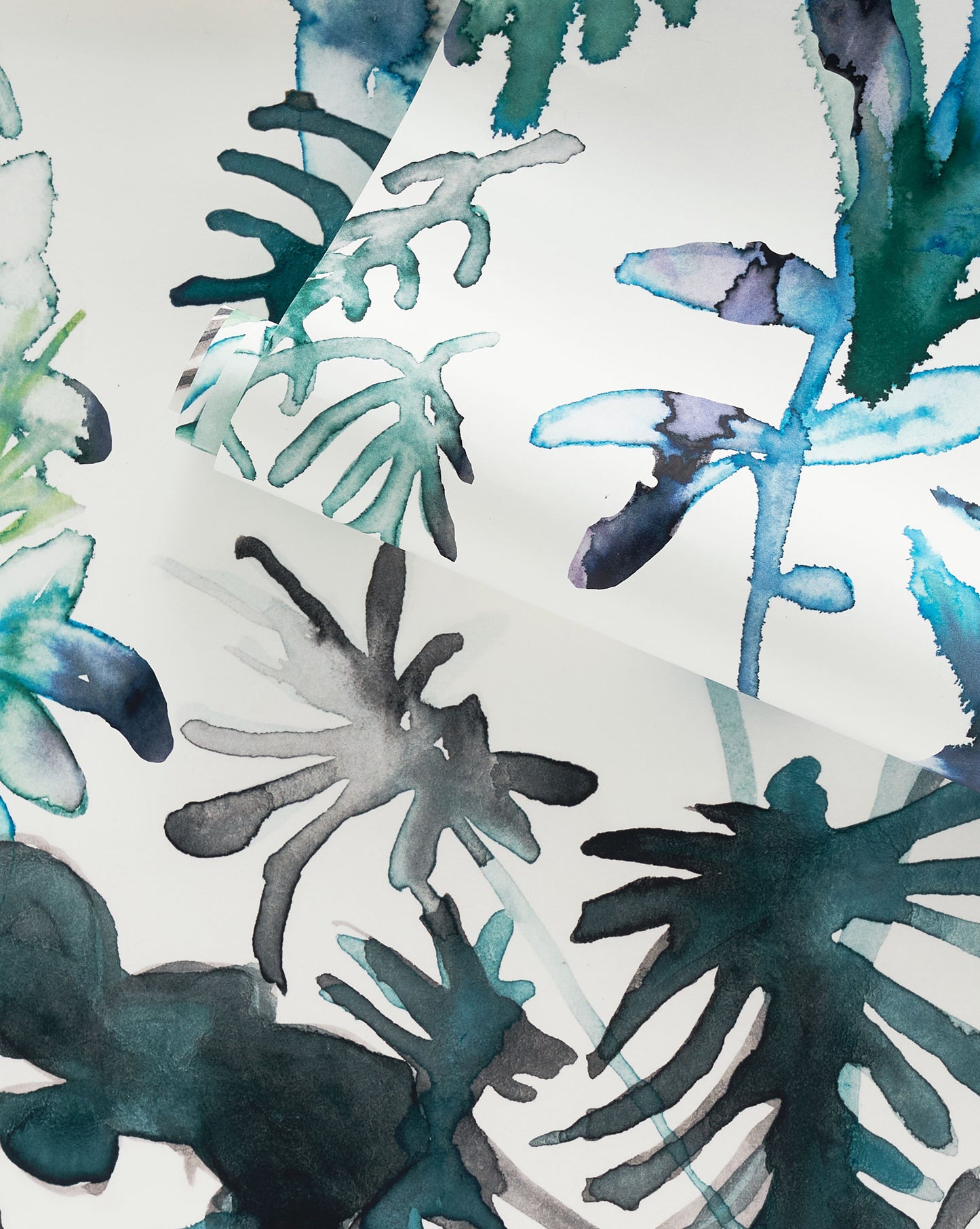 A watercolor painting of tropical leaves on wallpaper, ideal for creating custom houseplants or botanical pattern art like the Topiary Wallpaper Spruceon wallpaper