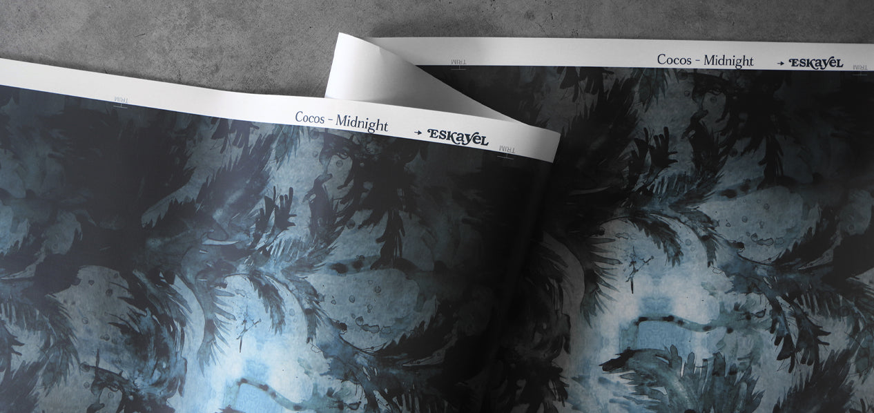 A flowy shot of Eskayels cocos wallpaper in the colorway midnight