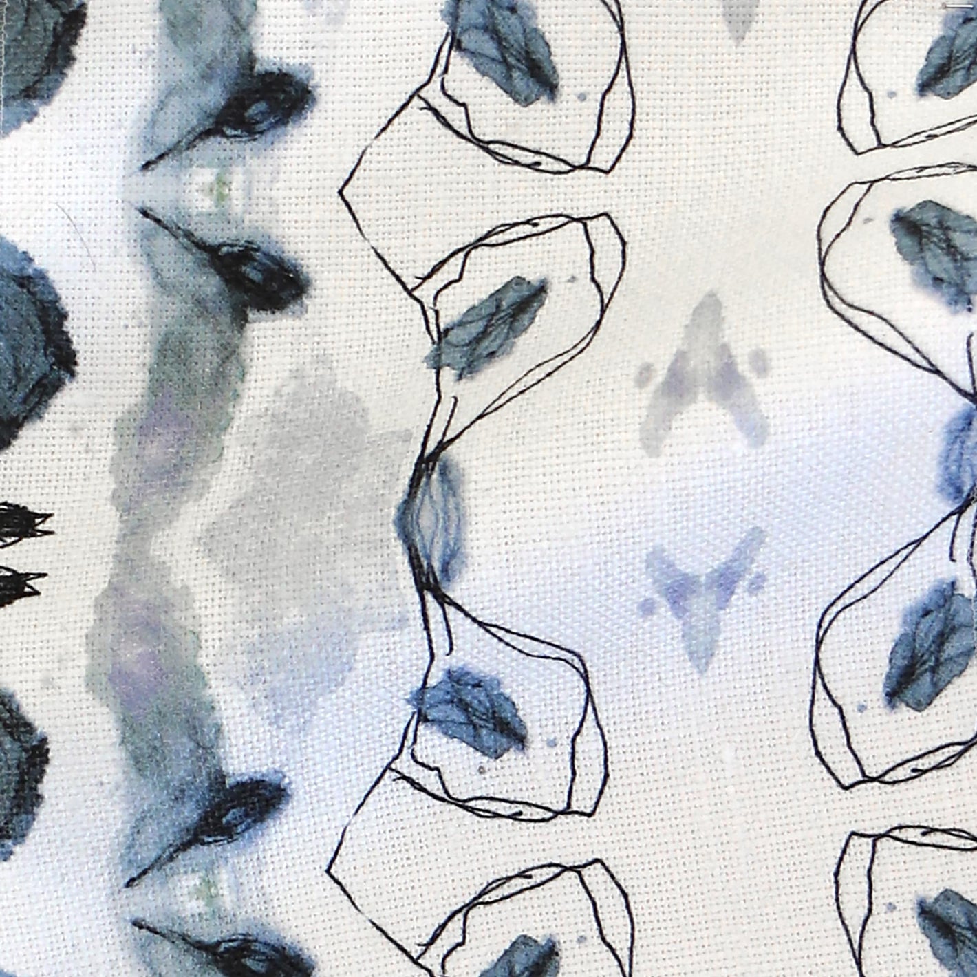A blue and white fabric with an abstract design