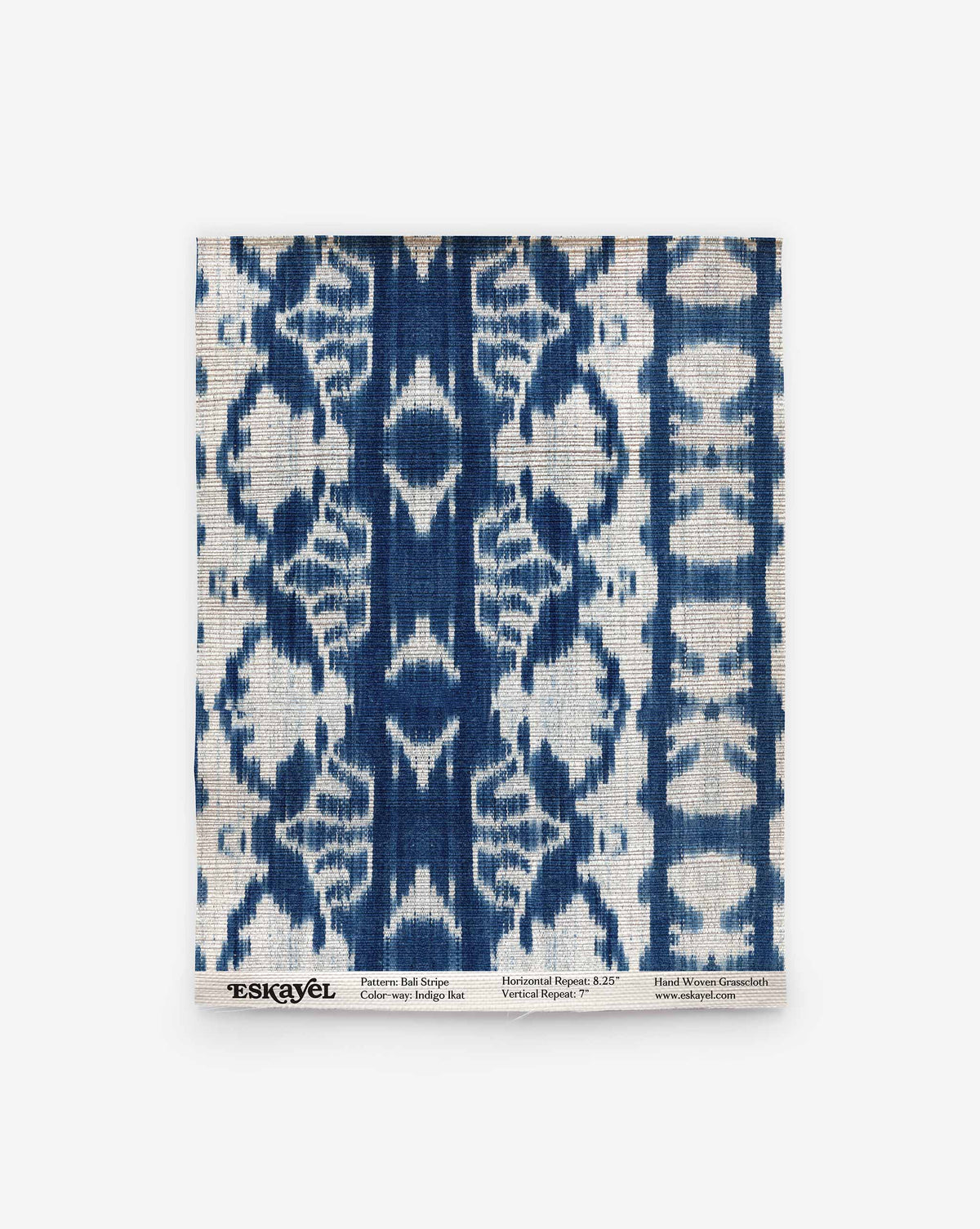 Bali Stripe Grasscloth in Indigo Ikat, a textile swatch featuring a blue and white indigo ikat stripe pattern.