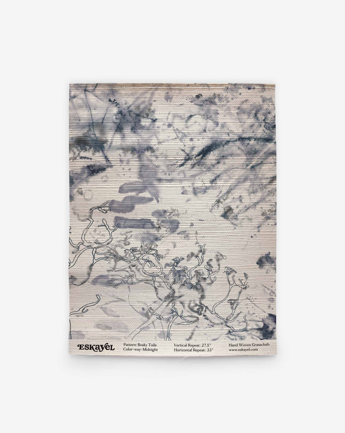 Sample of Bosky Toile Grasscloth||Midnight wallpaper featuring a dark blue and white watercolor pattern of wispy, hand-drawn branches on luxury sisal.
