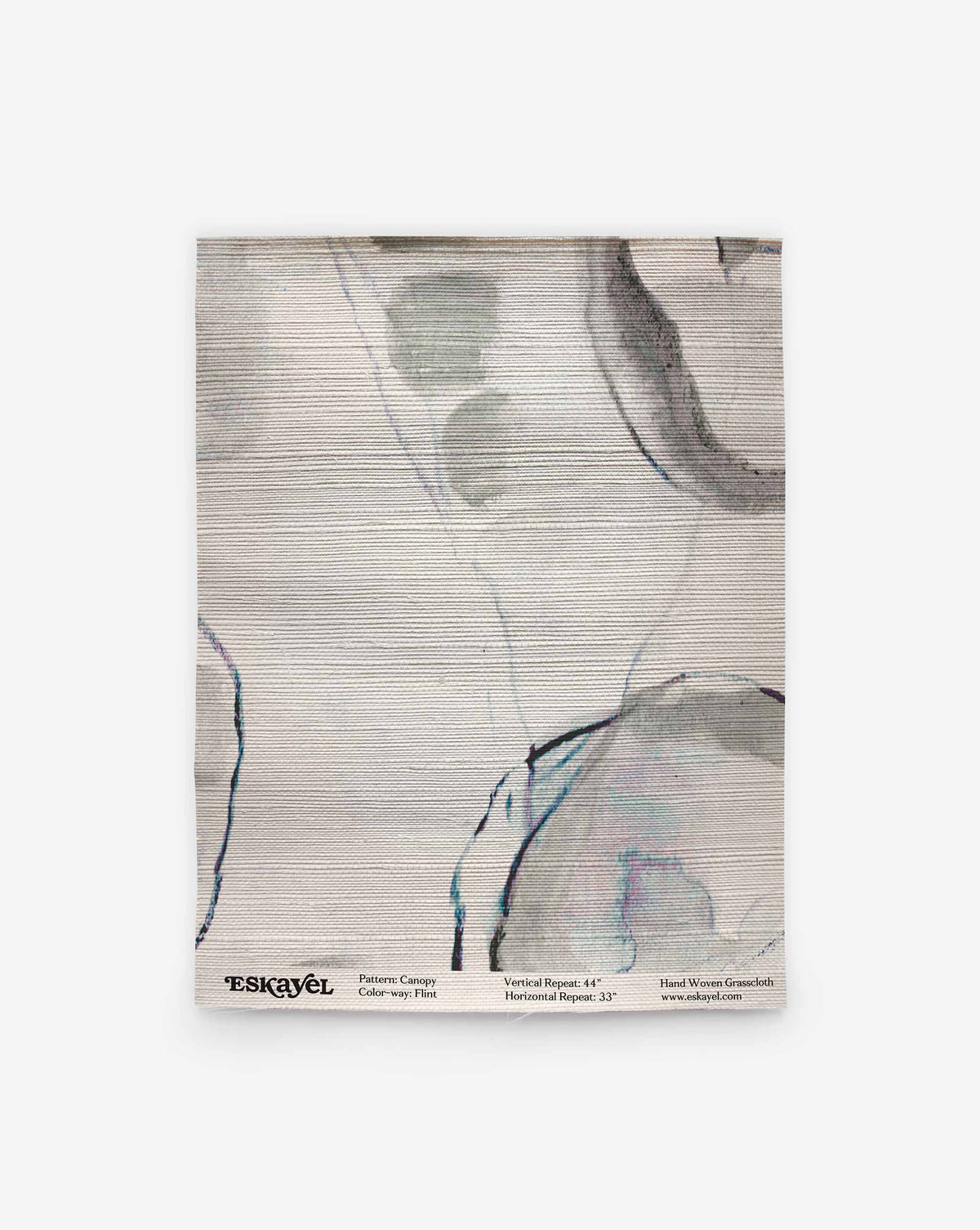 Canopy Grasscloth||Flint light-colored luxury wallpaper featuring an abstract ink-wash pattern of grey and blue organic shapes with a textural weave.