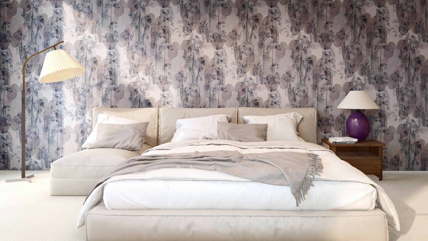 A white bed and a bedside lamp decorate the bedroom