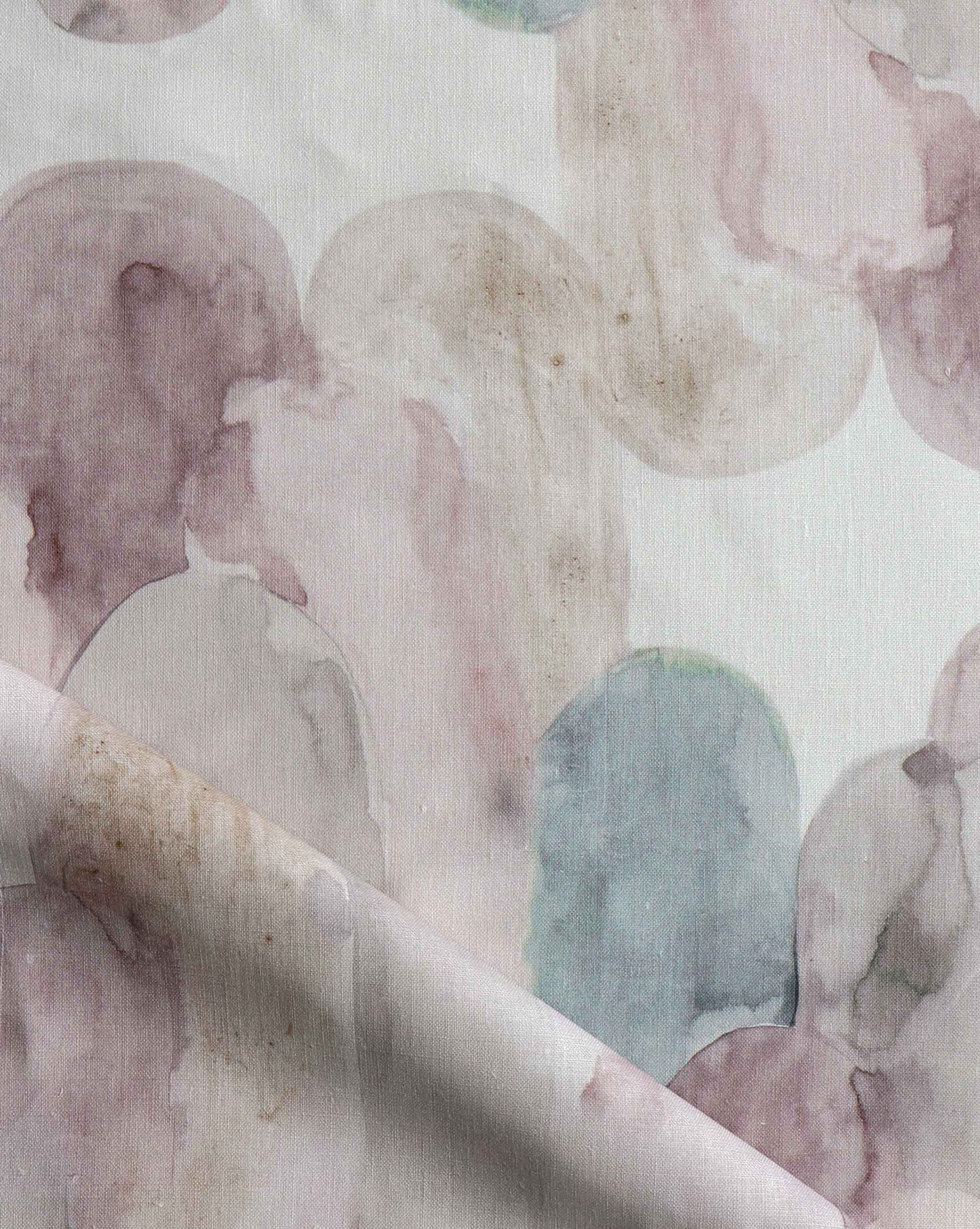 An image of a pink, blue, and purple Arcos Fabric Dusk print on a white fabric