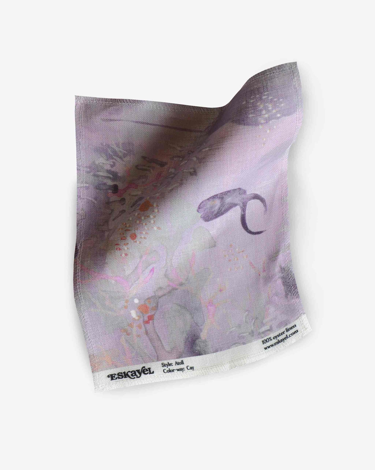 A swatch image of Eskayel’s Atoll print in the colorway Cay on linen fabric incorporating tones of purple with hints of orange.