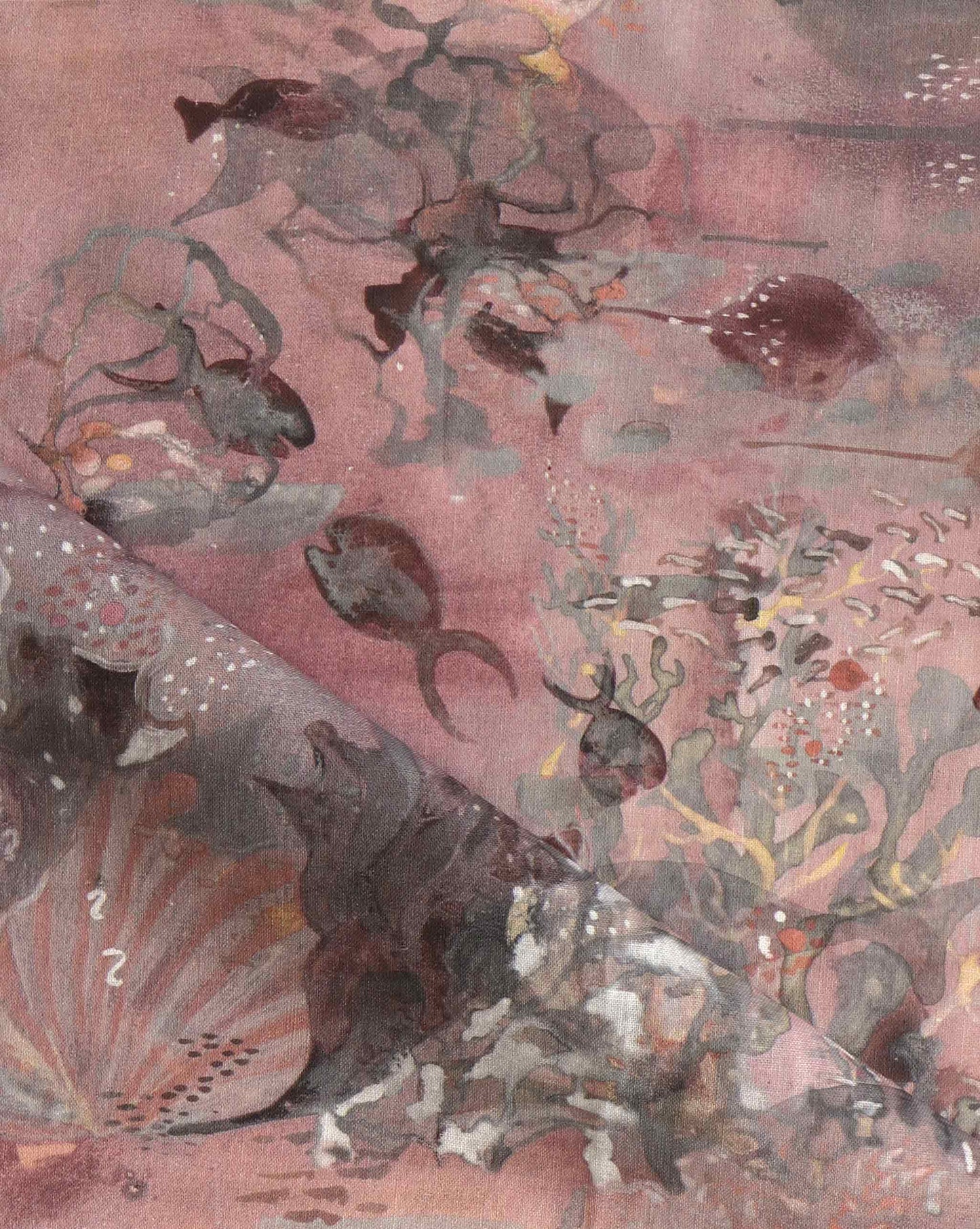 Atoll in Coral is a watery Eskayel print for fabric featuring a palette of reds and pinks.