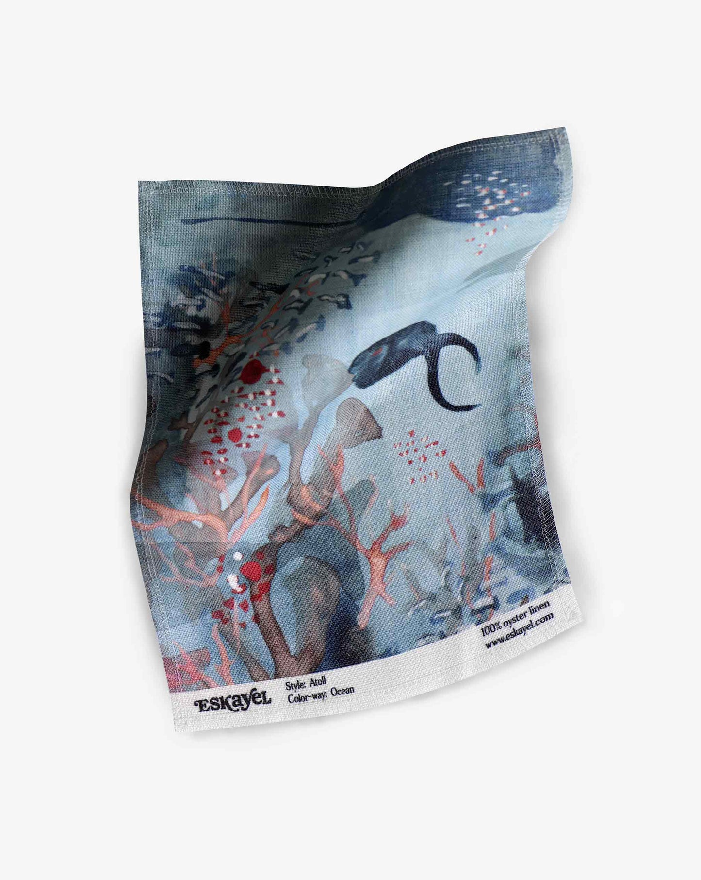 A swatch image of Eskayel’s Atoll print in the colorway Ocean on linen fabric incorporating tones of blue.