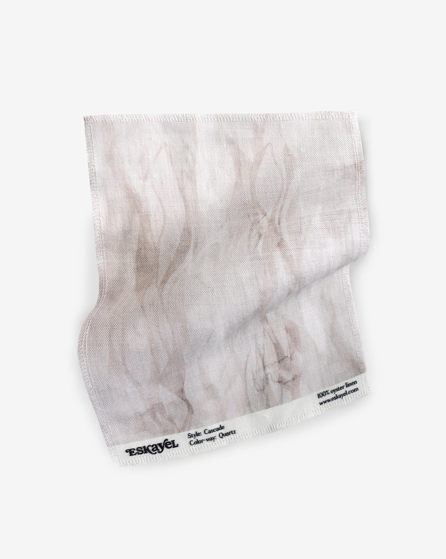 A fabric with our cascade pattern in quartz featuring a design that explores positive and negative space to evoke a feeling of vertical motion in shades of pink.