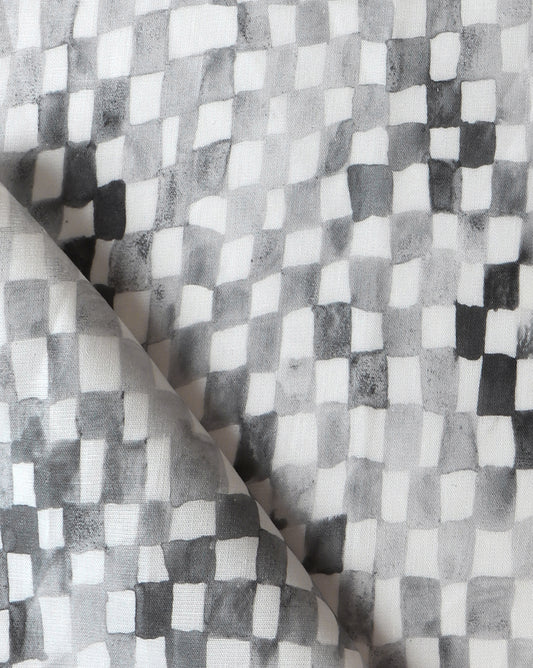 A close up of a black and white checkered fabric