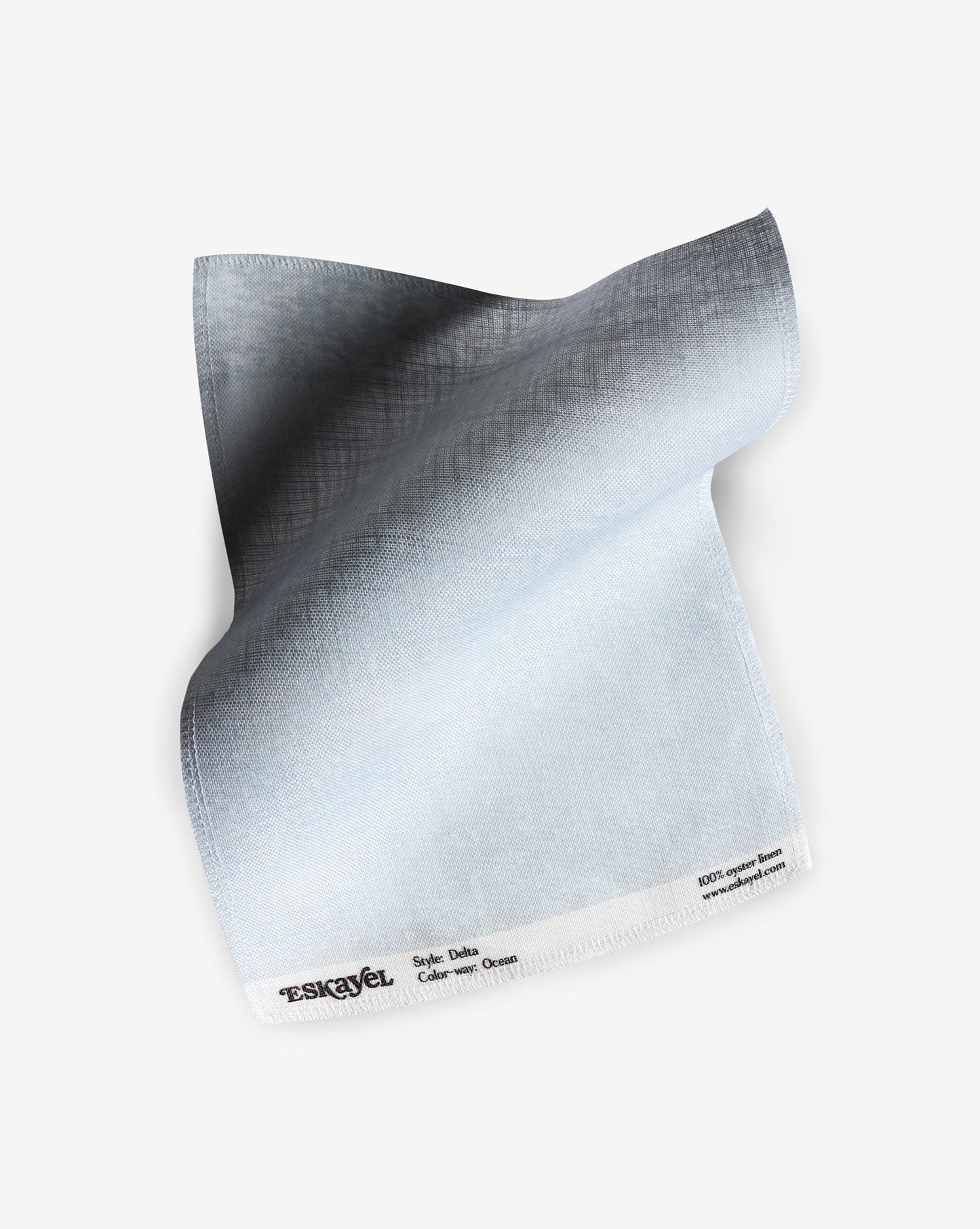 A fabric with our delta pattern in the ocean colorway featuring a design that transitions from consciousness to dream state in shades of blue.