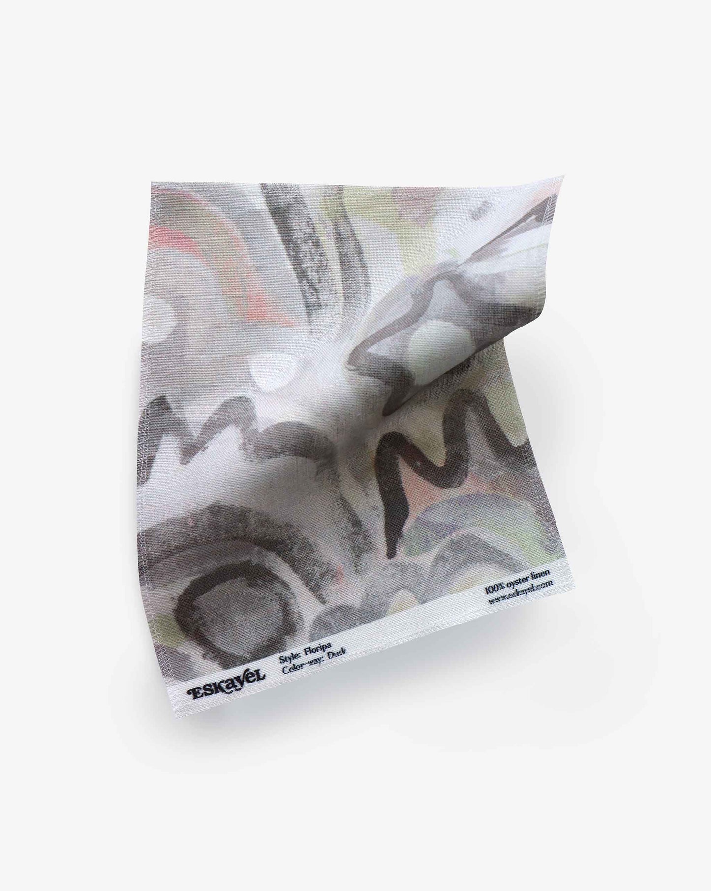 A fabric swatch with our Floripa pattern in Dusk featuring a design inspired by the beautiful tropical island of Florianopolis in Brazil provides a colorway of grey hues.