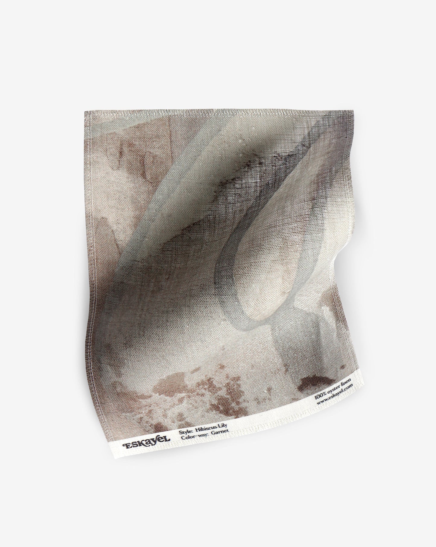A fabric with our hibiscus lily pattern in garnet featuring a design of overlapping petals slowly shifting in place as they unfurl in shades of brown.