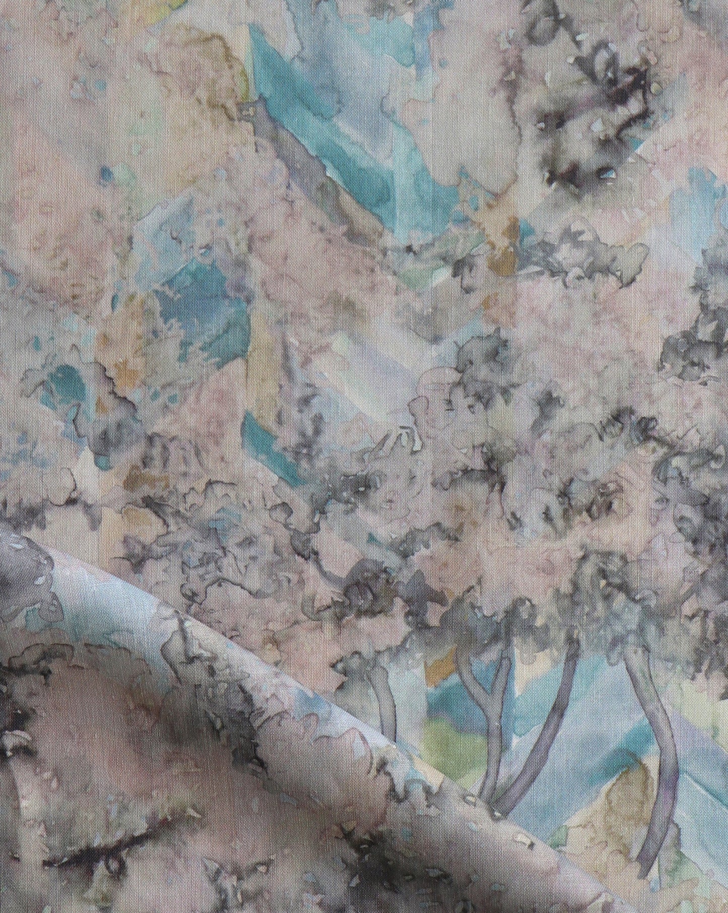 Featuring a floral study on chevrons, Inflorescence fabric in the Sage colorway features shades of blue, beige and grey