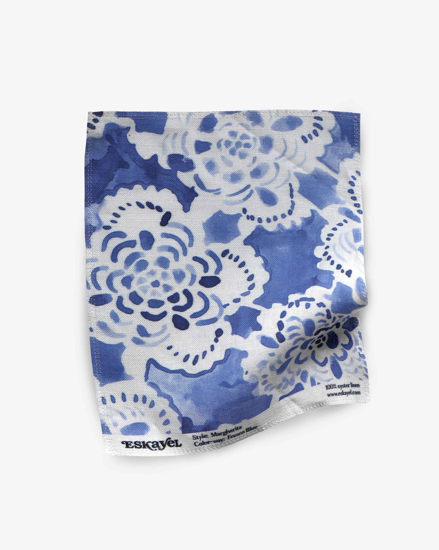 A swatch of Margherita in Fresco Blue shows the medium-sized repeat fabric – a floral watercolor design – in shades of blue.