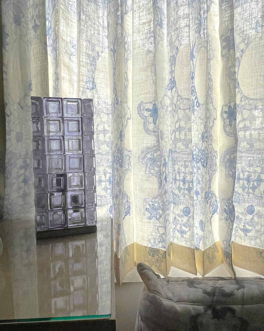 In the Fresco Blue colorway, Nonna’s Lace fabric is a loose watercolor pattern of floral lace in shades of blue.