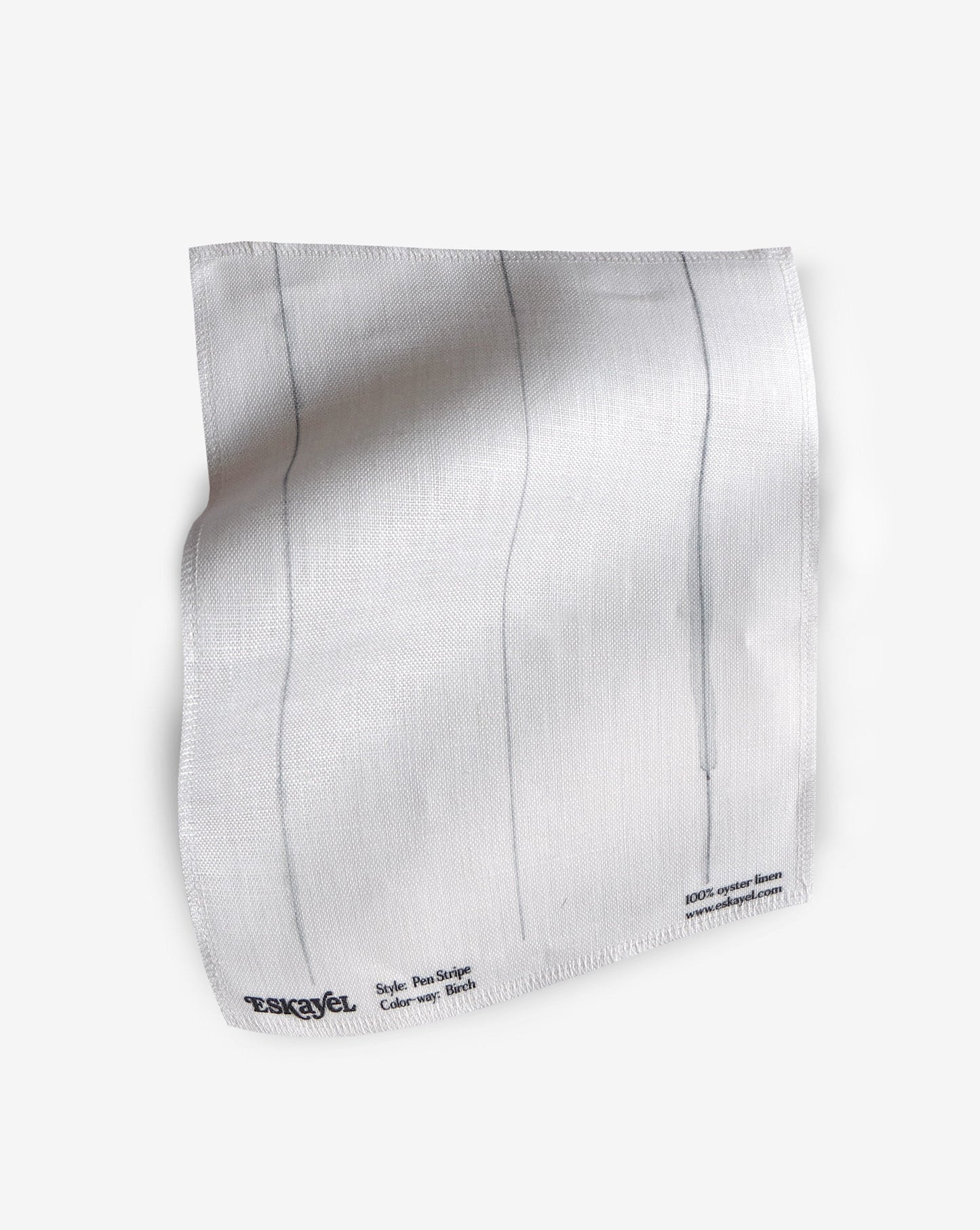 A fabric with our pen stripe pattern featuring a conventional pinstripe design of straight inky lines in grey and white.