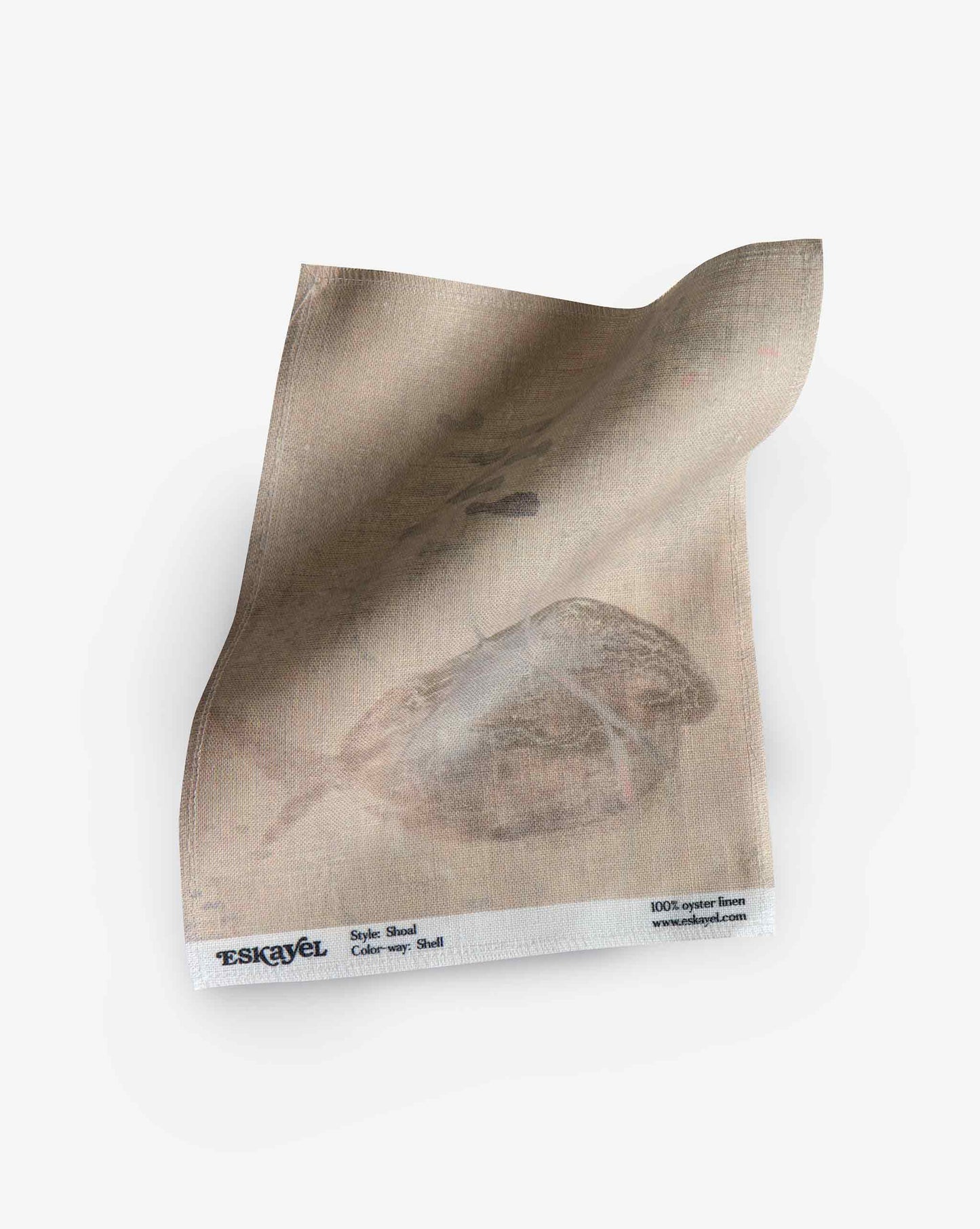 A swatch image of Eskayel’s Shoal print in the colorway Shell on linen fabric incorporating tones of beige.