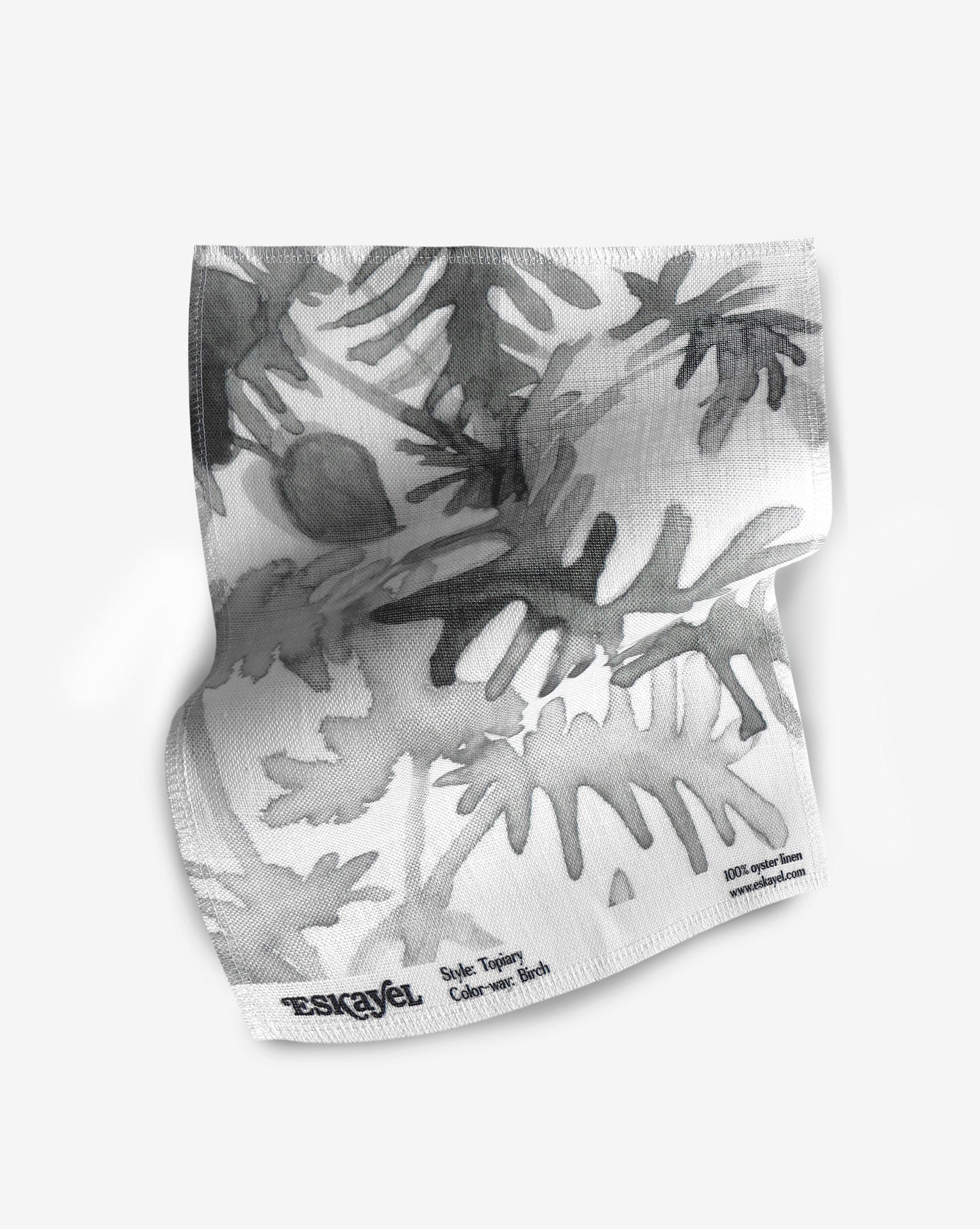 A fabric with our topiary pattern featuring a botanical design of varying indoor plants in grey and white.