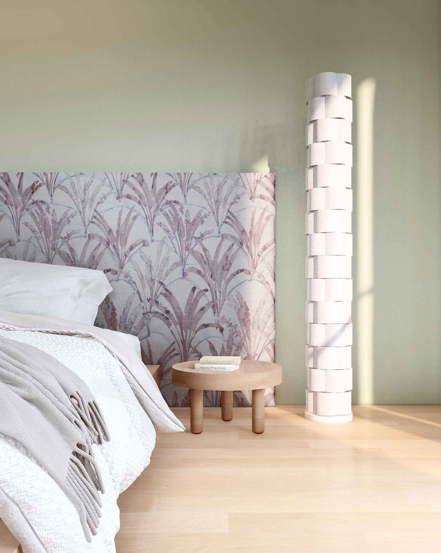 A bedroom with a bed and a Travelers Palm Fabric Pomegranate lamp