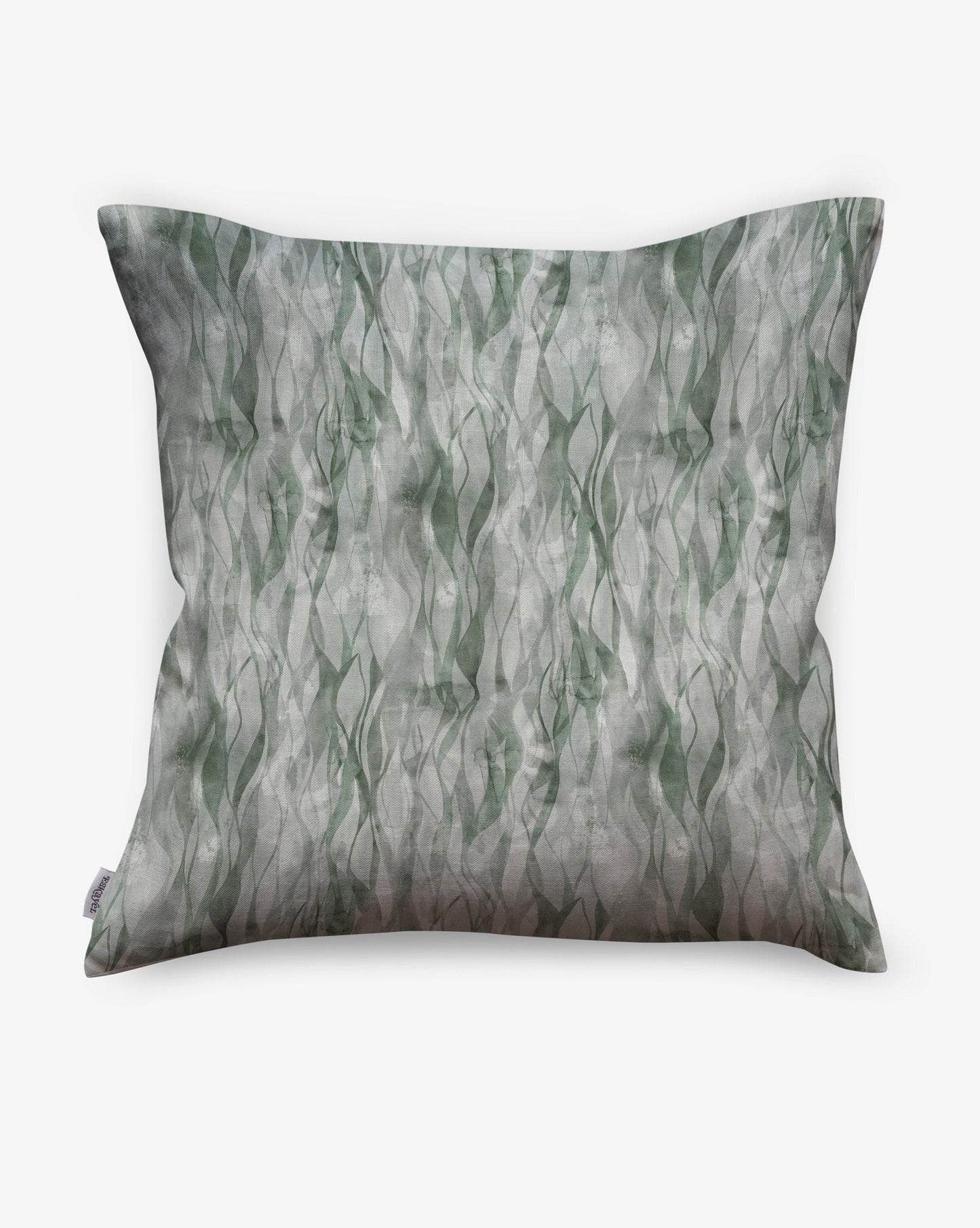 Cascade linen pillows in Tourmaline combine green hues in a watercolor design.