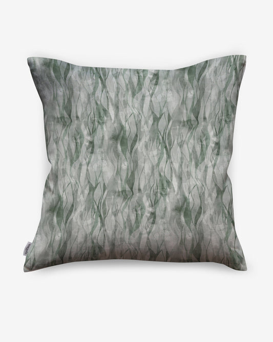Cascade linen pillows in Tourmaline combine green hues in a watercolor design.