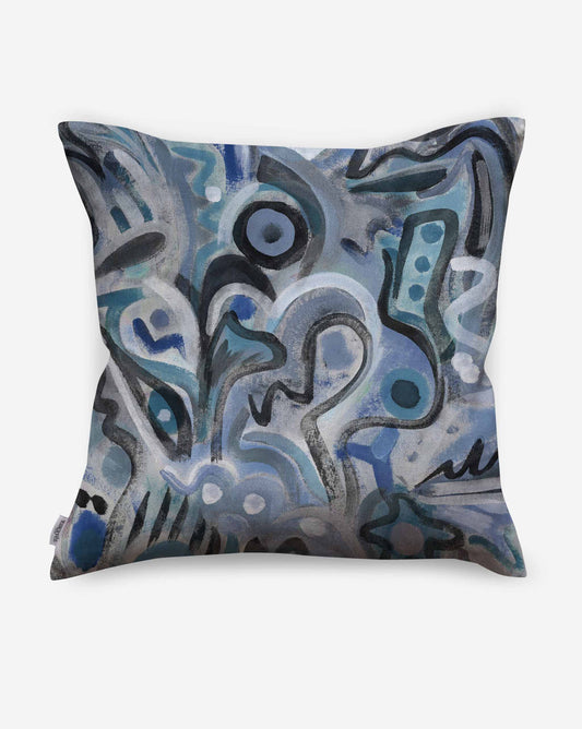 Eskayel Floripa pillows in Nuit depict an imaginative tropical pattern in shades of blue.