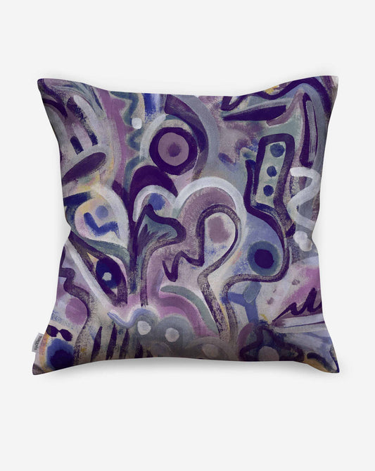 Floripa custom pillows by Eskayel in the Pomegranate colorway provide tones of purple.