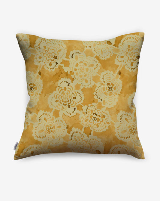 A pillow in Eskayel’s Margherita pattern in Limoncello offers a warm watercolor palette of yellow hues.