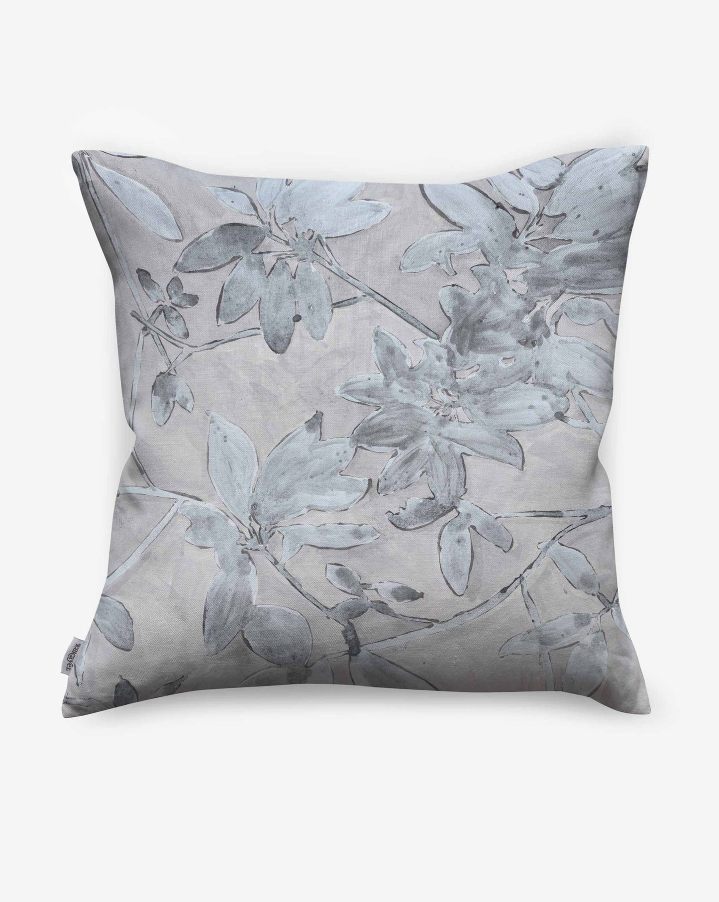 A photo of Eskayel’s Plumeria Shadows pillow pattern in the Shadow colorway featuring a grey palette.
