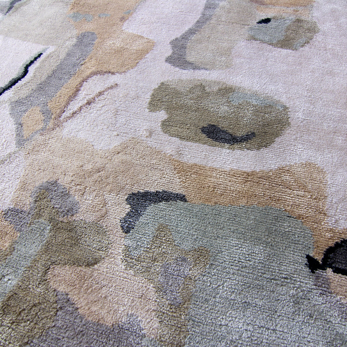 A close-up of a rug with a pattern on it