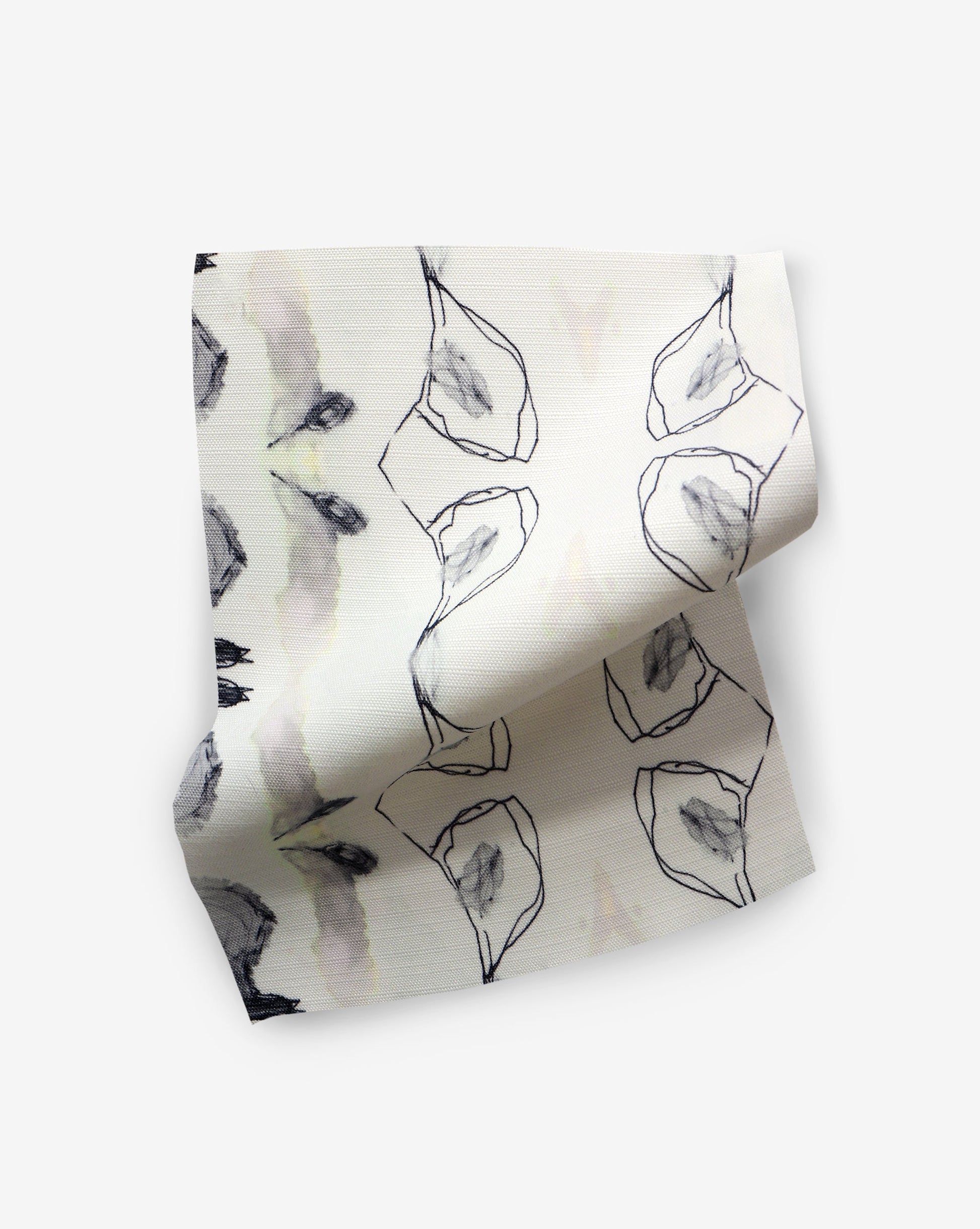 A black and white design on a piece of Bali Stripe Performance Fabric in Sand