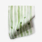 A Bamboo Stripe Performance Fabric napkin made from luxury performance fabric on a white surface