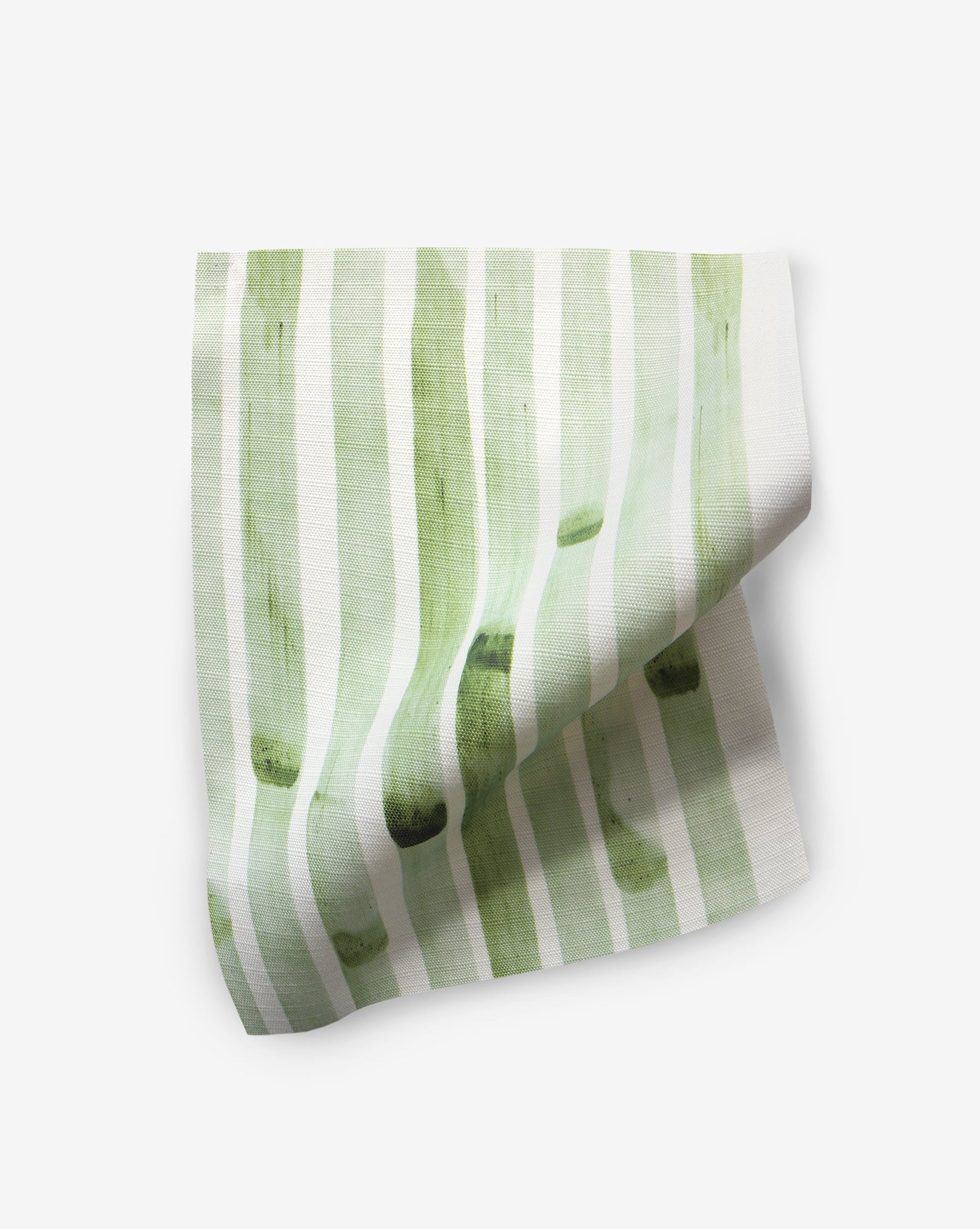 A Bamboo Stripe Performance Fabric napkin made from luxury performance fabric on a white surface