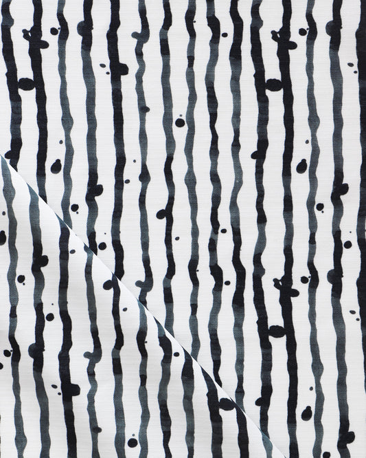 Drippy Stripe Performance Fabric Slate design featuring black and white stripes on a luxury performance fabric
