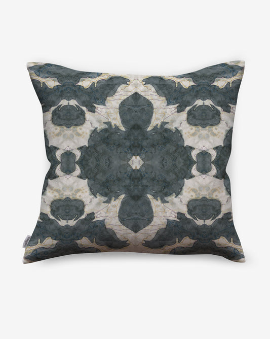 A floral-patterned outdoor pillow from The Dance Outdoor Pillow Olive Collection