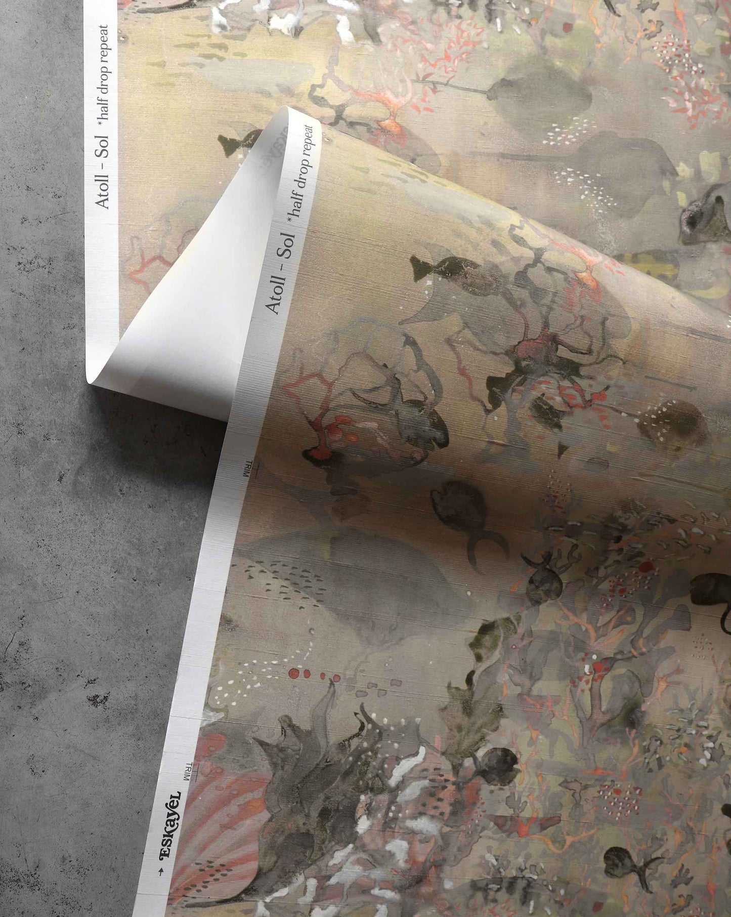 A close up detailed shot of Eskayel’s Atoll wallpaper in the colorway Sol with its beige hues.