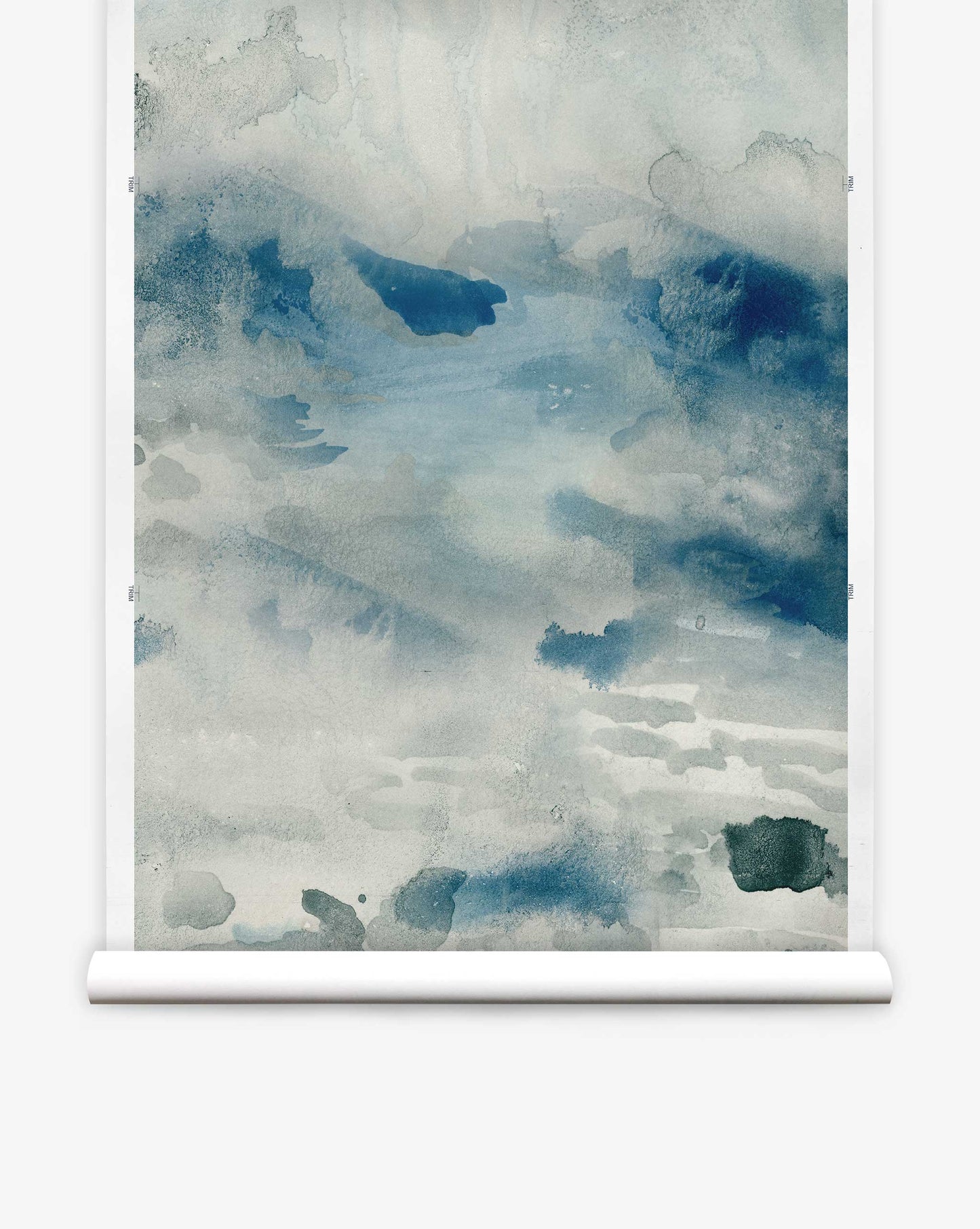 The Empyrean Silk Mural by Cyrrus reveals an abstract watercolor design, blending blue and green hues reminiscent of a misty sky.