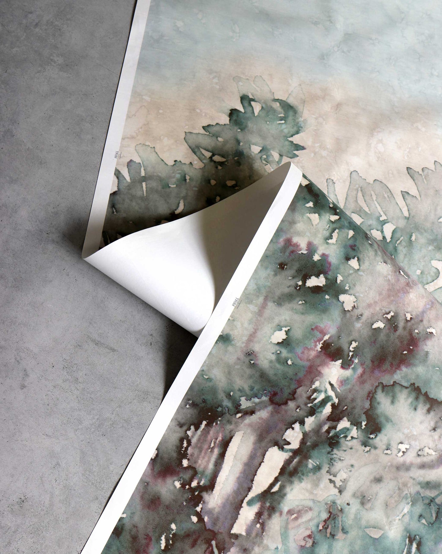A detailed shot of Eskayel’s Prospect wallpaper Mural in the colorway Verde which has tones of beige and green.