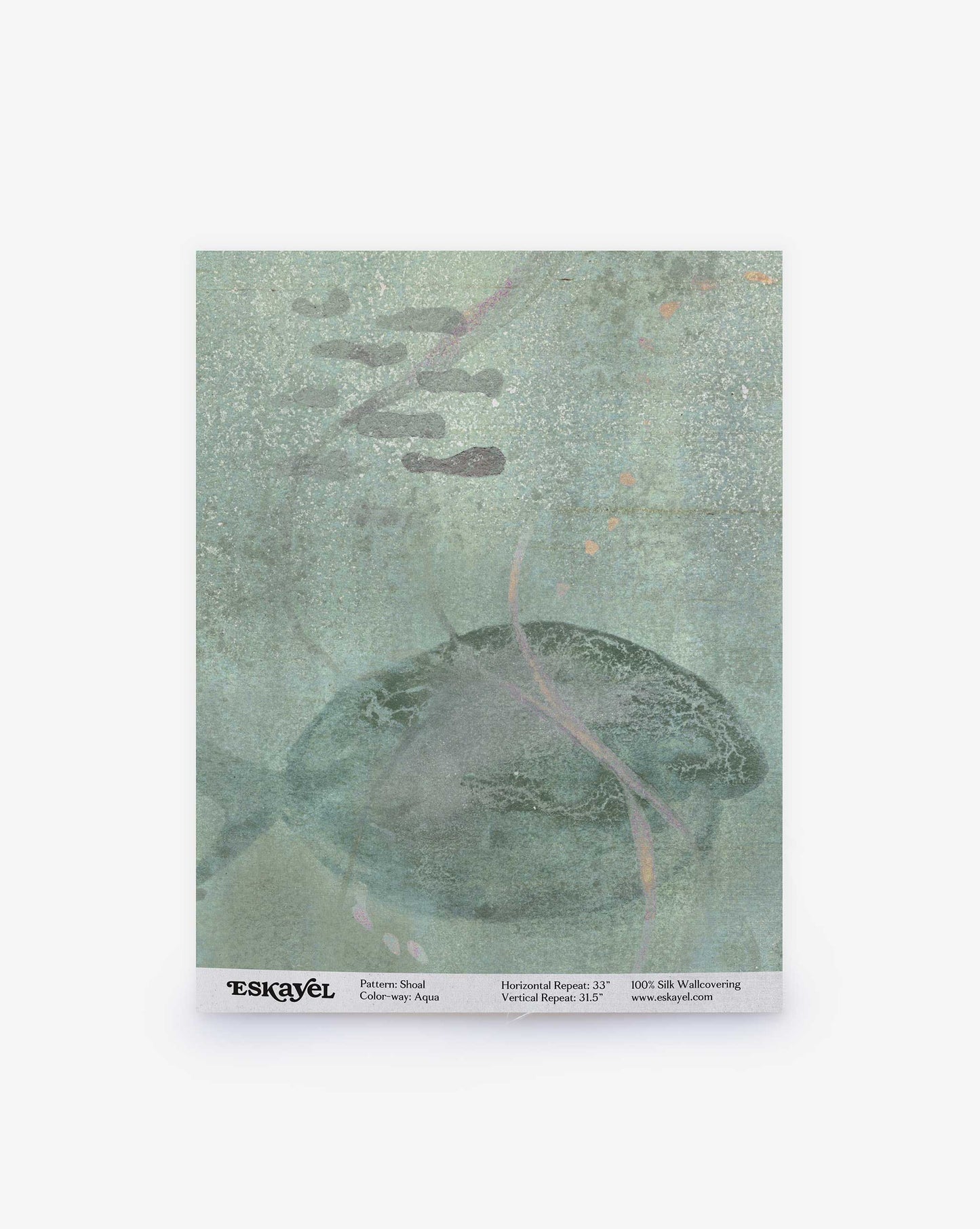 A swatch of Eskayel’s Shoal pattern on paper backed silk wallpaper in the colorway Aqua with its green hues.