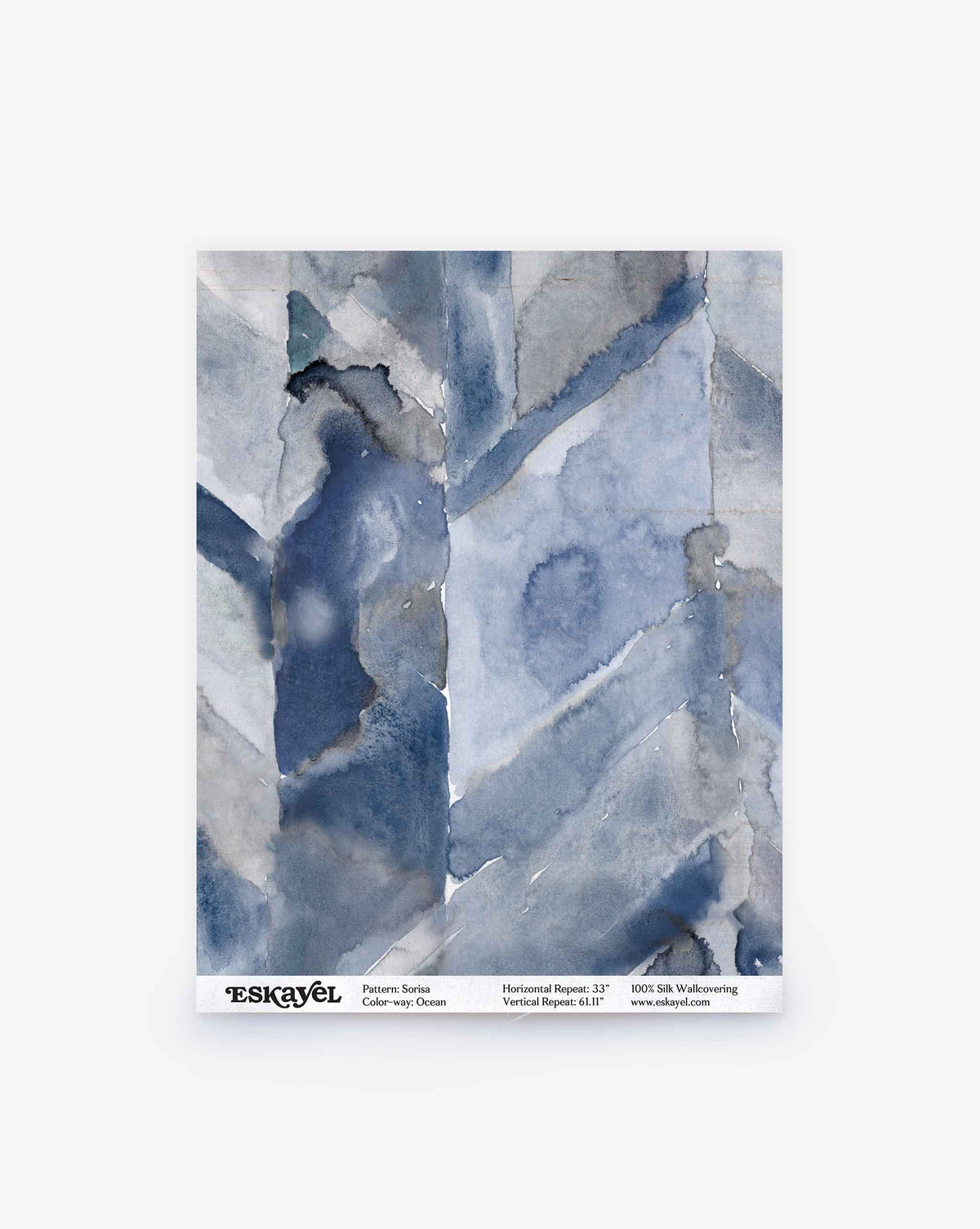 A sample of Sorisa Silk Wallcovering||Ocean features abstract, watercolor-style blue and gray patterns, labeled “Pattern: Sarka,” “Color: Stormy Ocean.”.