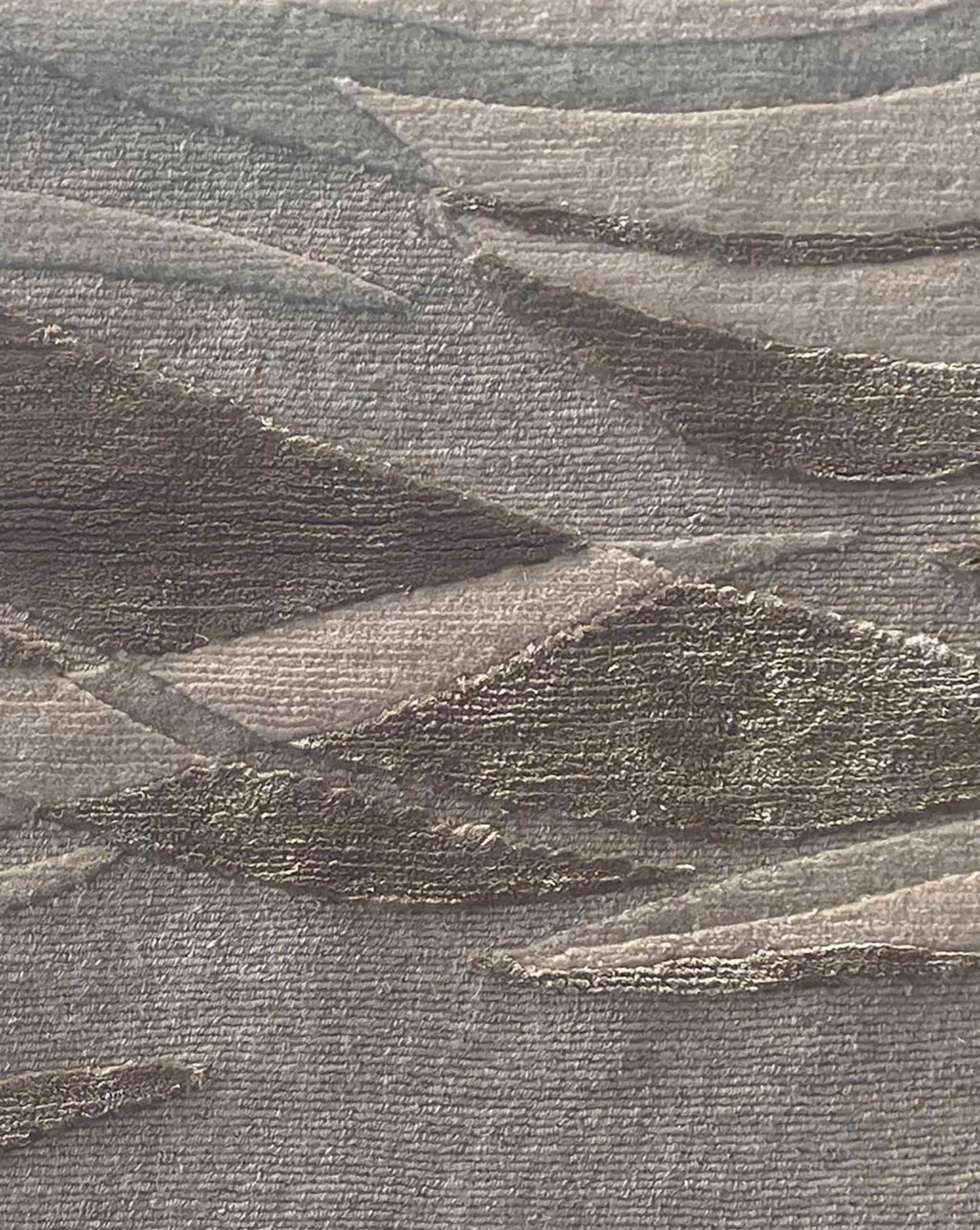 Closeup of Cascade rug in Sable – A hand-knotted custom rug in an abstract flowing pattern using neutral shades of grey and taupe | Eskayel