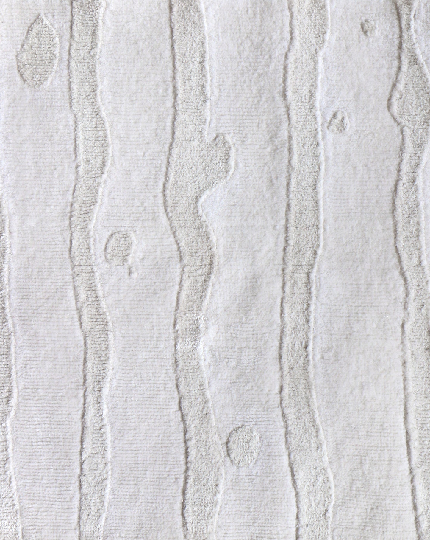 A close up of the Drippy Stripe Hand Knotted Rug 9' x 12' in Lefko White.