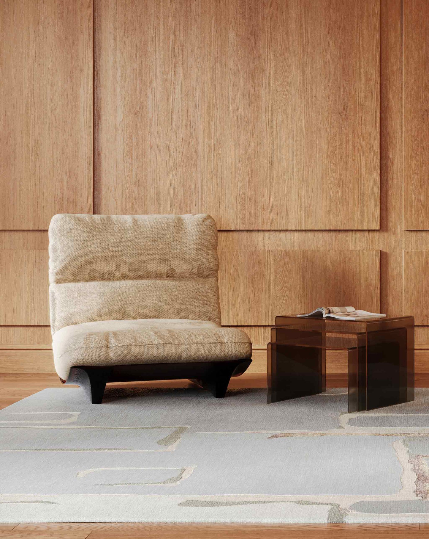 Eskayel’s Neighbors rug in Cloud with its multi-hued colorway with grey undertones is installed in a sitting room with a chair and a side table.