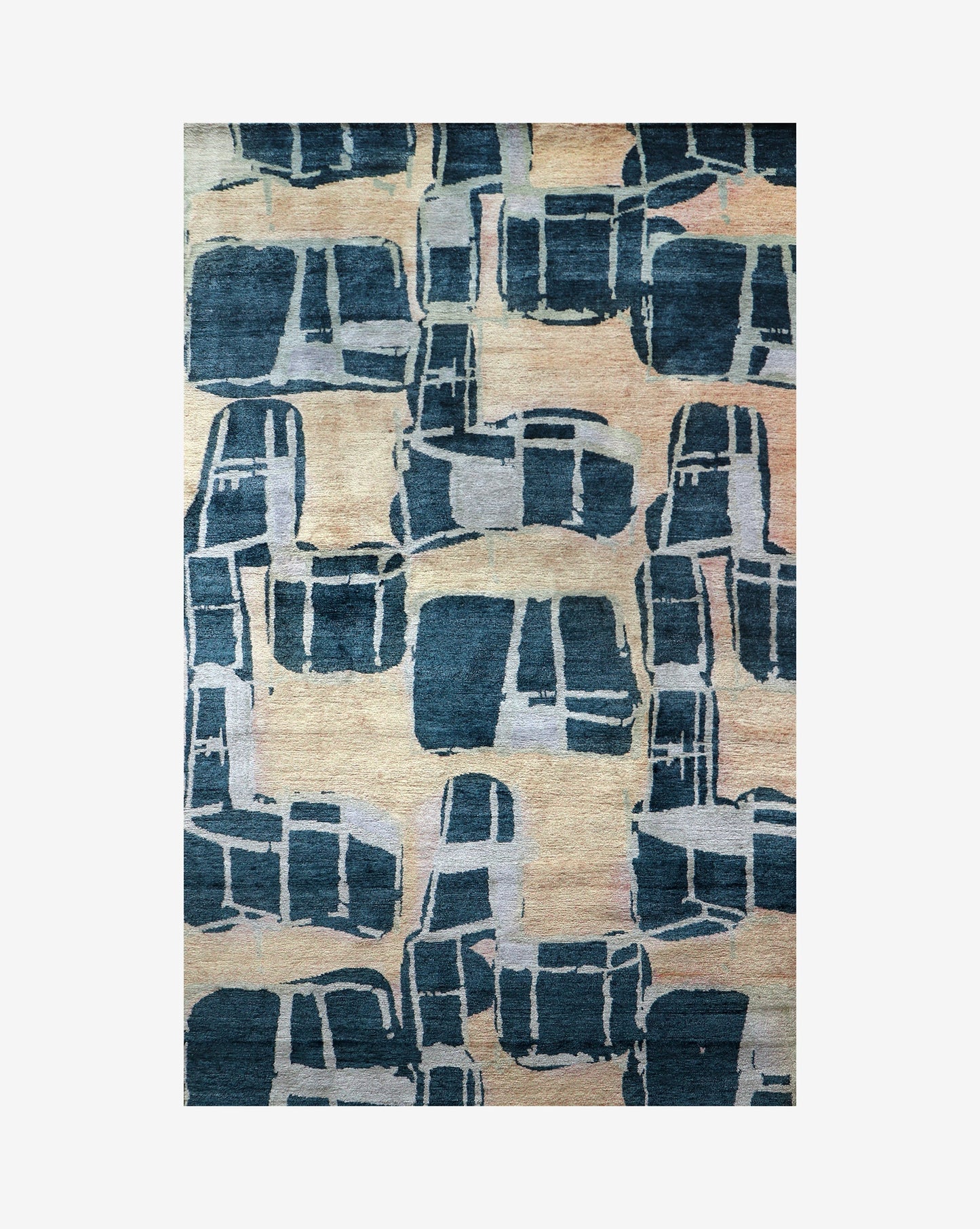 A blue and beige Quotidiana Hand Knotted Rug 5' x 8' Corinth design with abstract designs on it